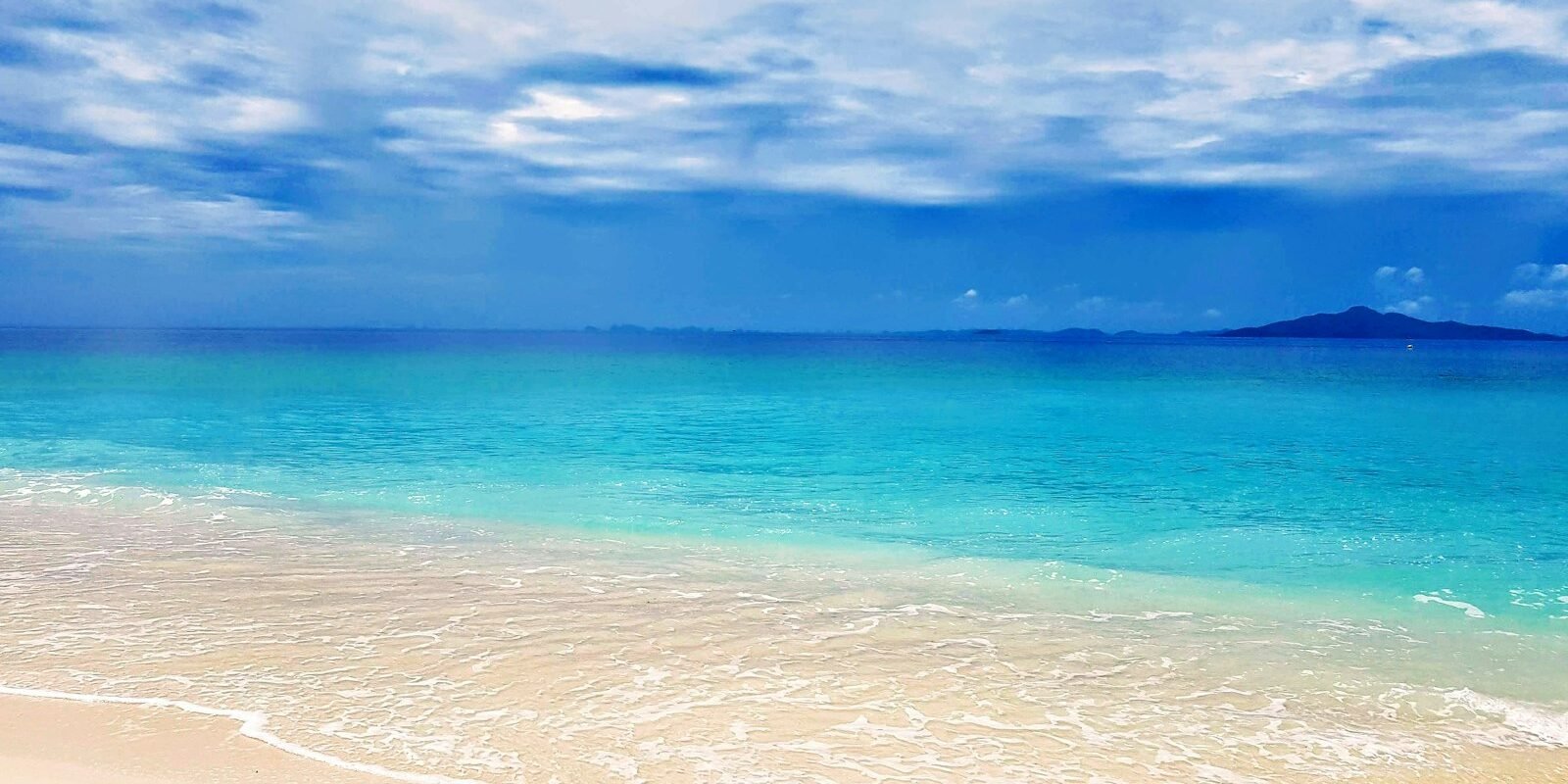 Tropical white-sand beach on the Andaman Sea