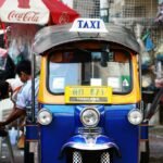 Colourful tuk-tuks parked on a Bangkok street