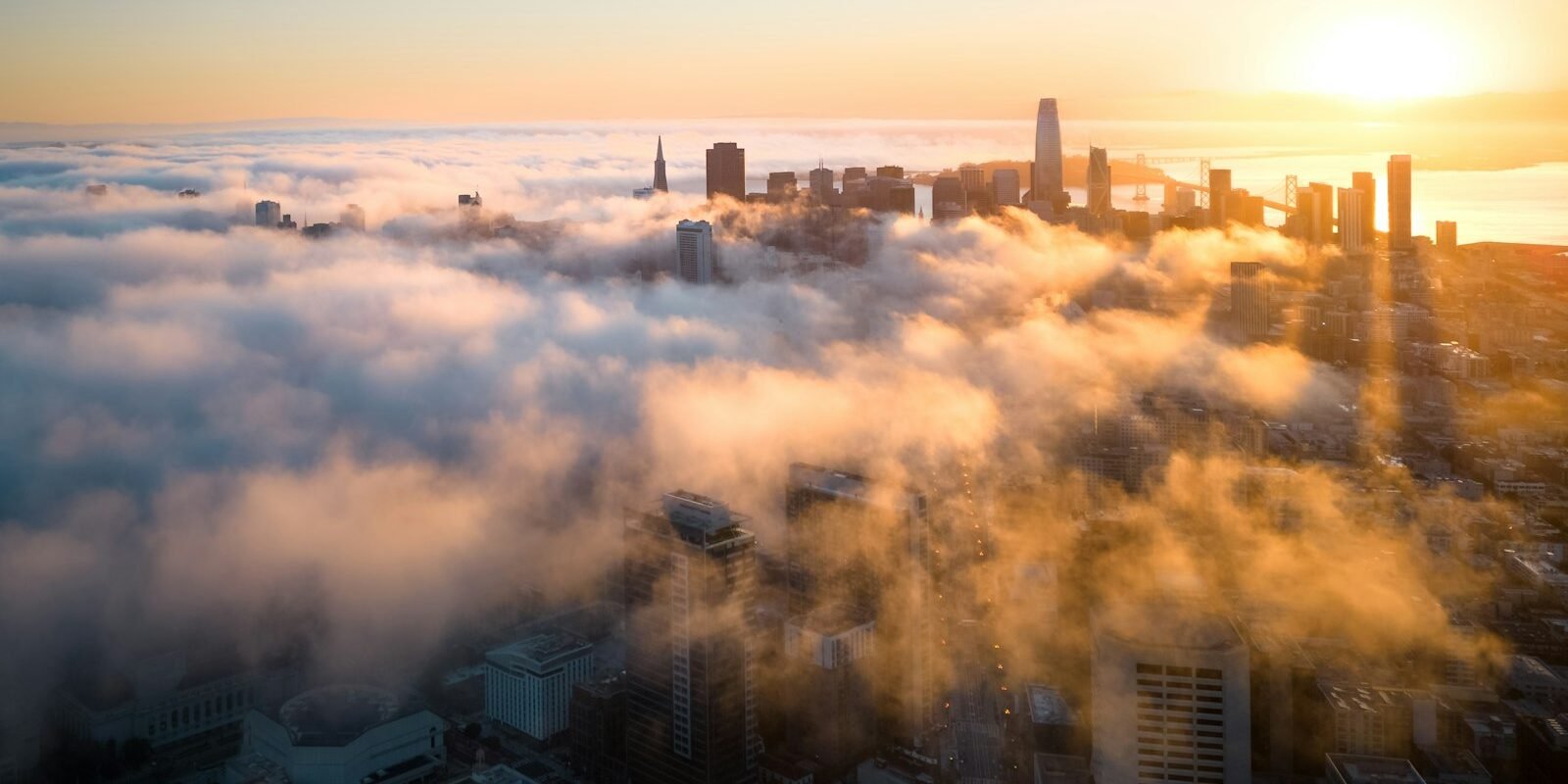 Fog rolling over San Francisco at sunrise