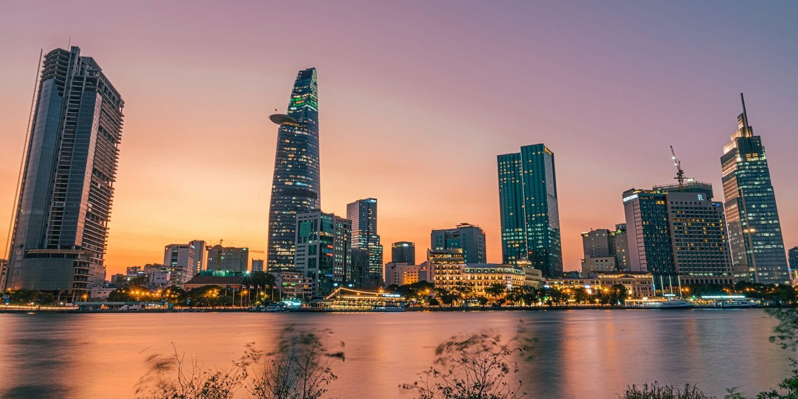 Ho Chi Minh City skyline on the Saigon River at dusk