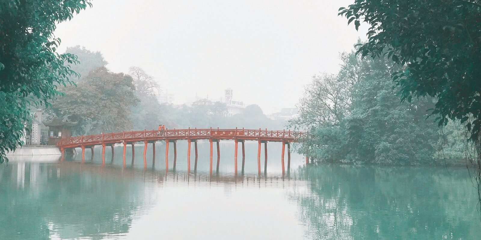 The red Huc Bridge on Hoan Kiem Lake, Hanoi