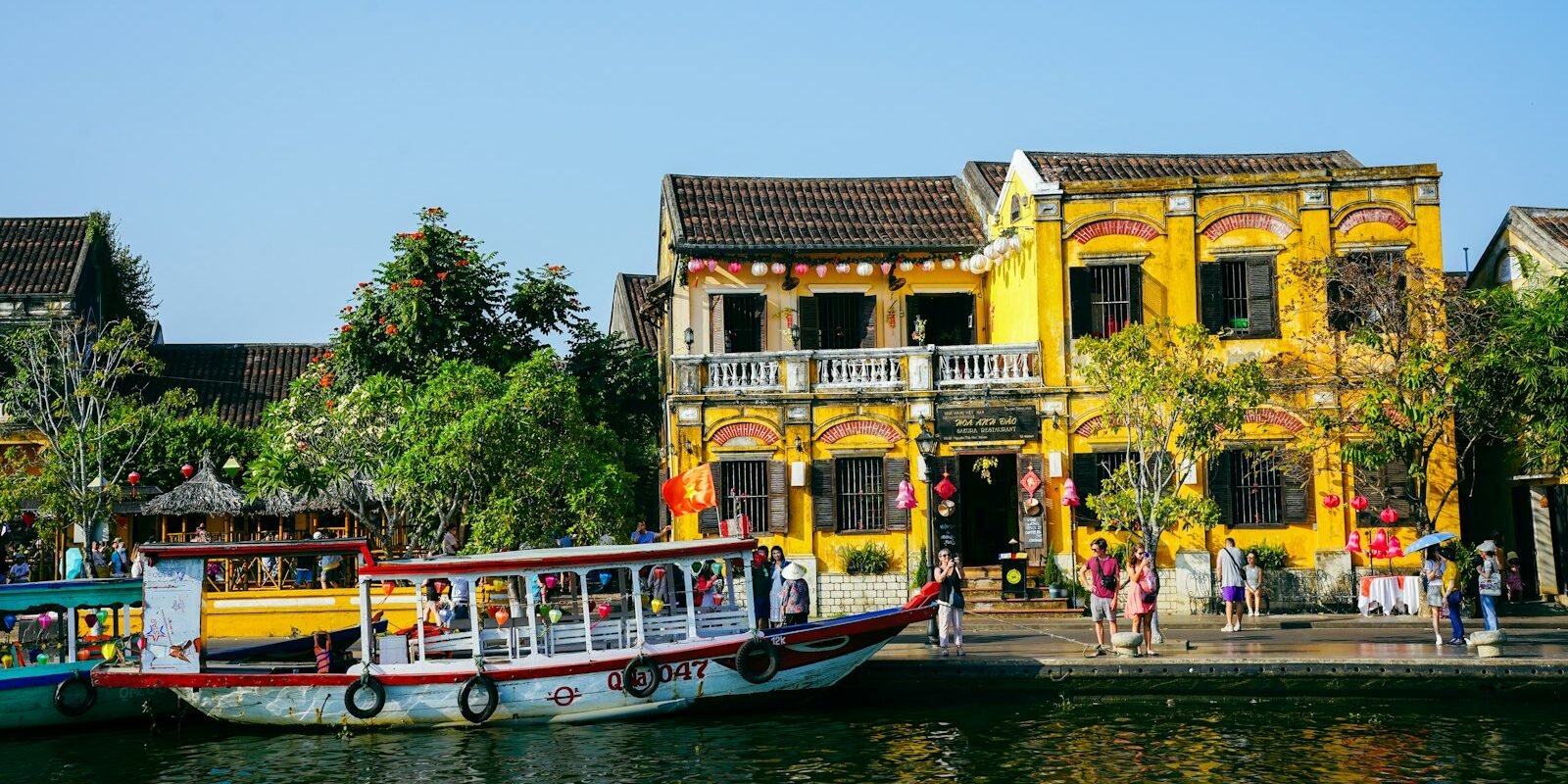 Yellow houses along the river in Hoi An