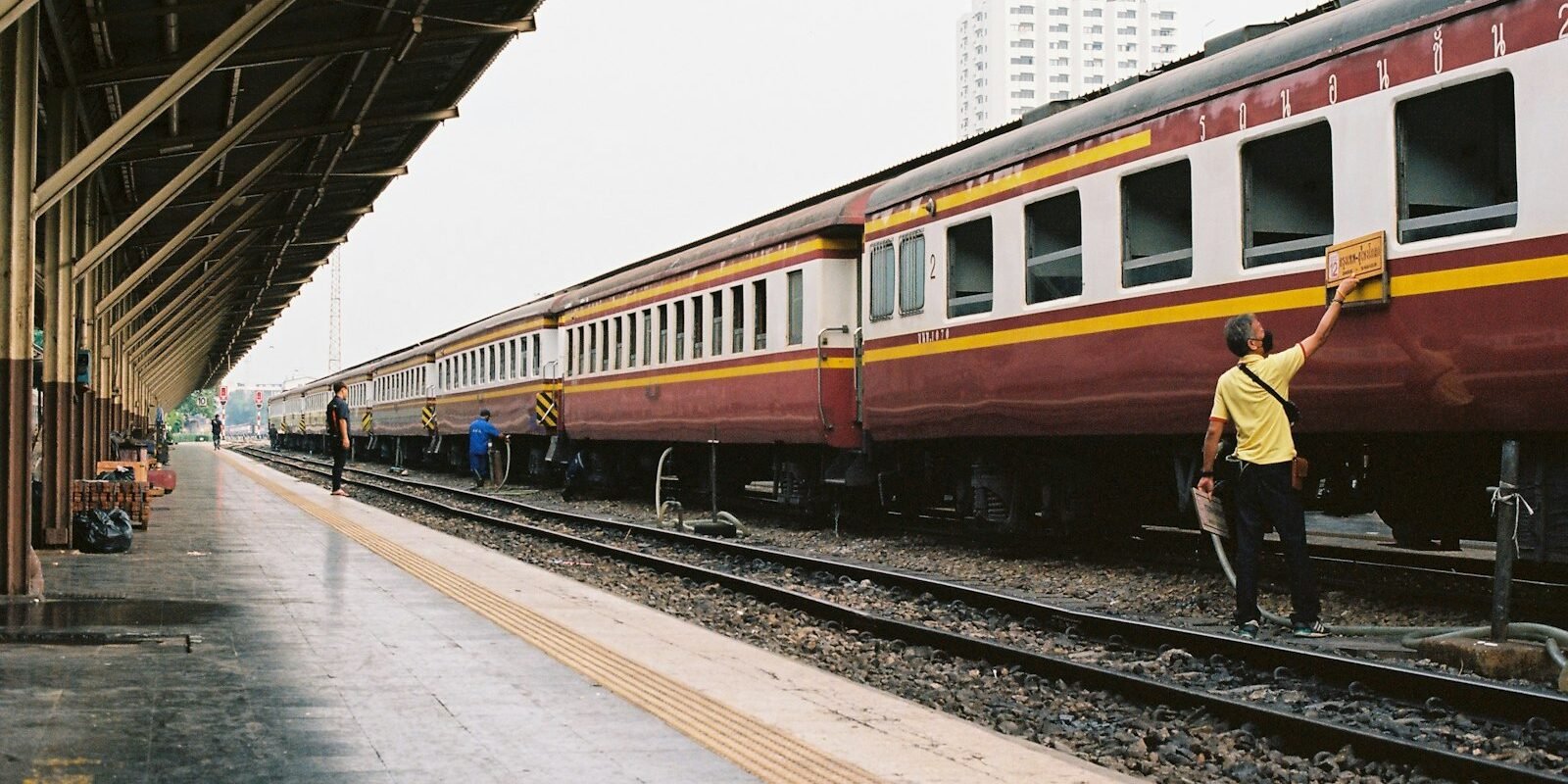 Train at a platform in Thailand