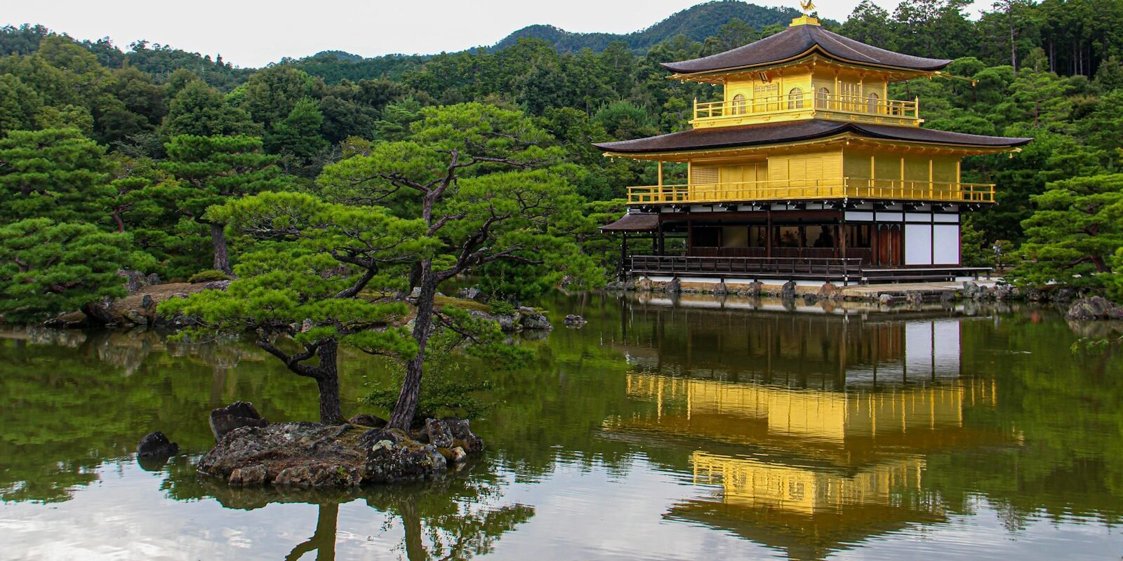 Kinkaku-ji, the Golden Pavilion, reflected in its pond