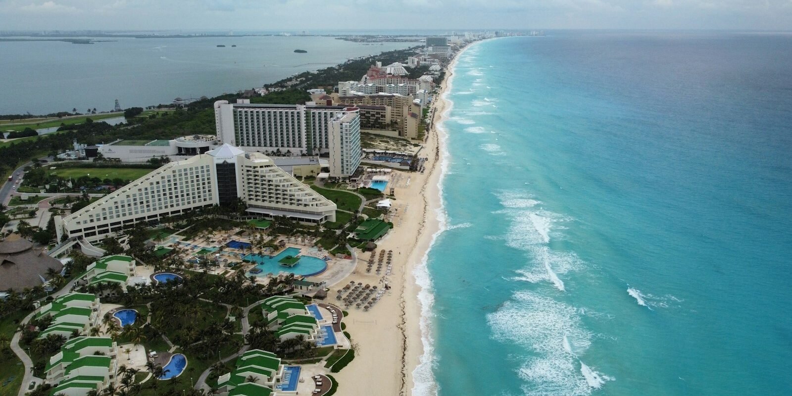 Aerial view of Cancún Hotel Zone resorts along the Caribbean