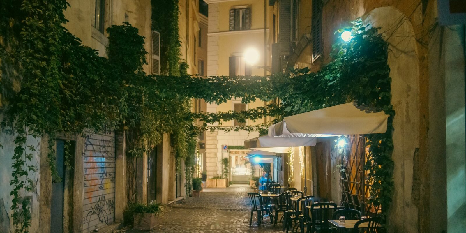An ivy-covered lane in Trastevere at night